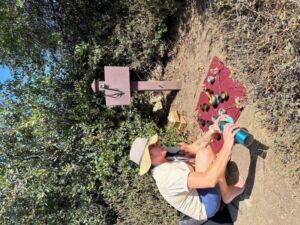 Desiree pouring tea at Laguna 824 - Association of Nature & Forest Therapy