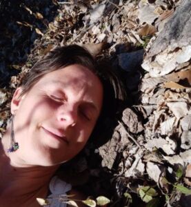 Head In Leaves Resting - Association of Nature & Forest Therapy