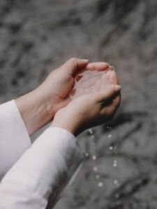 Ntentionally Outdoors Guided Forest Therapy Walks Forest Bathing Hands Holding Water Stream River - Association of Nature & Forest Therapy